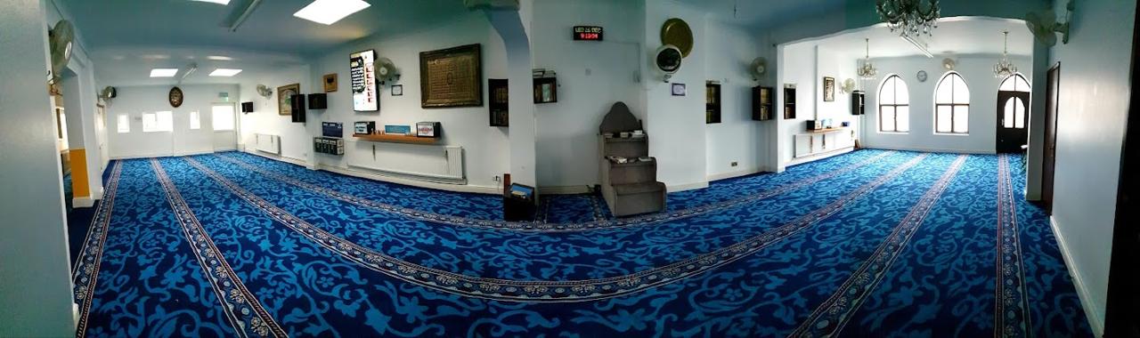 Prayer room with blue carpet